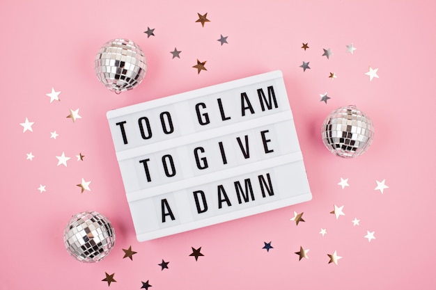 Lightbox with phrase Too glam to give a damn