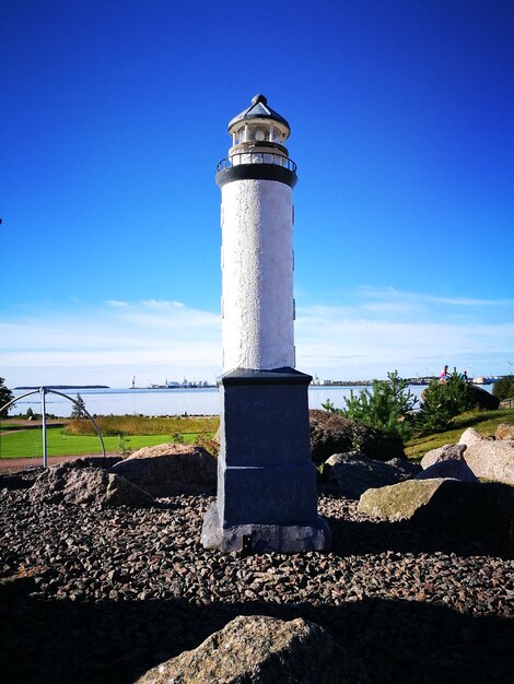 Lighthouse against blue sky