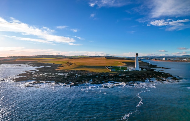 Lighthouse on the coast of the North Sea in Scotland view from above