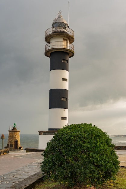 A lighthouse or light signaling tower located on the sea coast or on the mainland