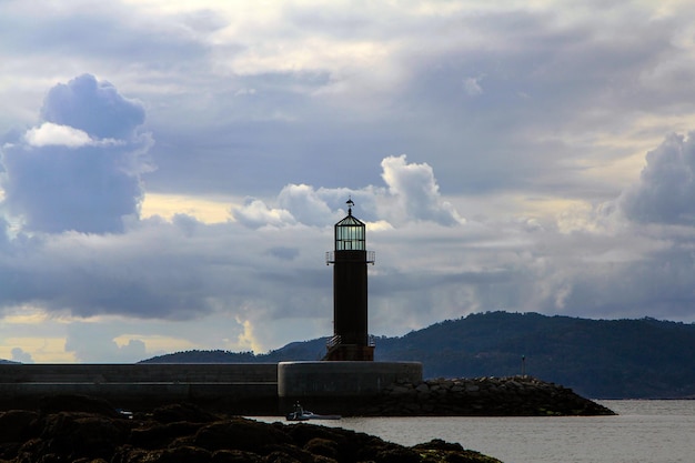 A lighthouse in the sky Vigo estuary Galicia spain