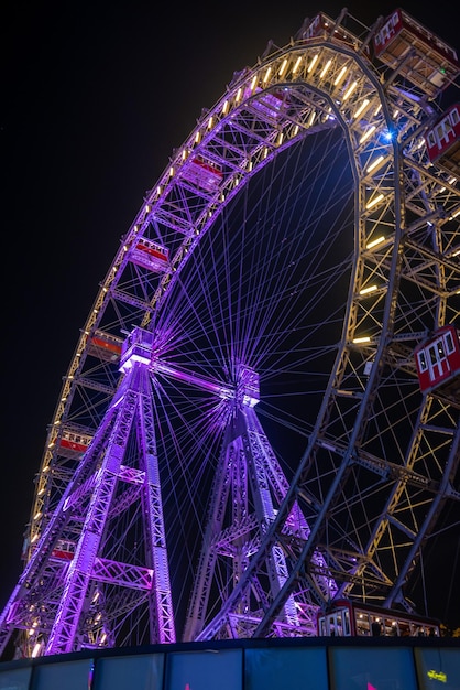 Lighting Ferris wheel at night in Vienna