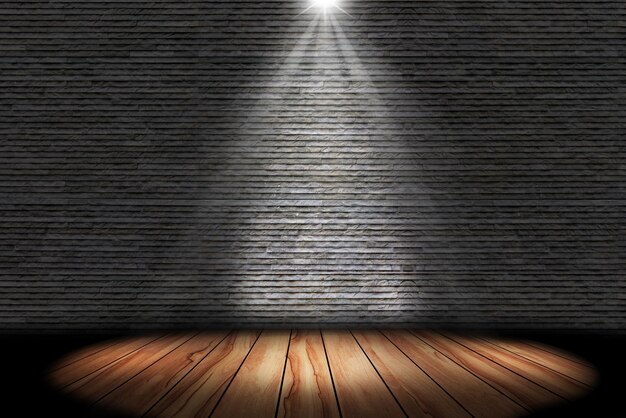 Photo lighting on stage with brick wall and floor wood