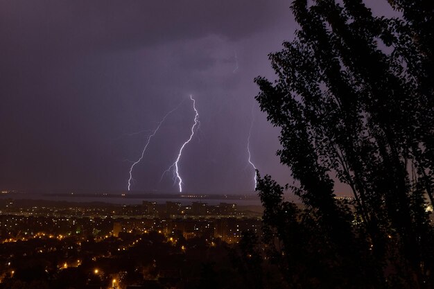 Lightning strikes a multistory building at night