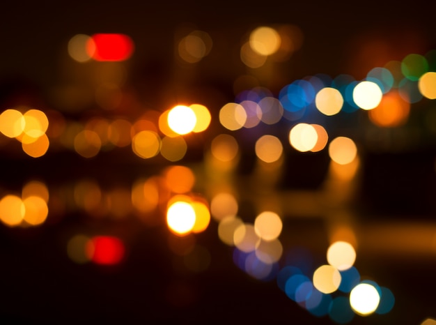 Lights blurred bokeh background from christmas night party for your design 