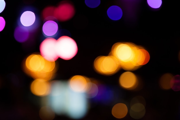 Lights blurred bokeh background from night party for your design