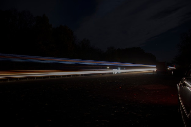 Lights from passing cars. Tracer.