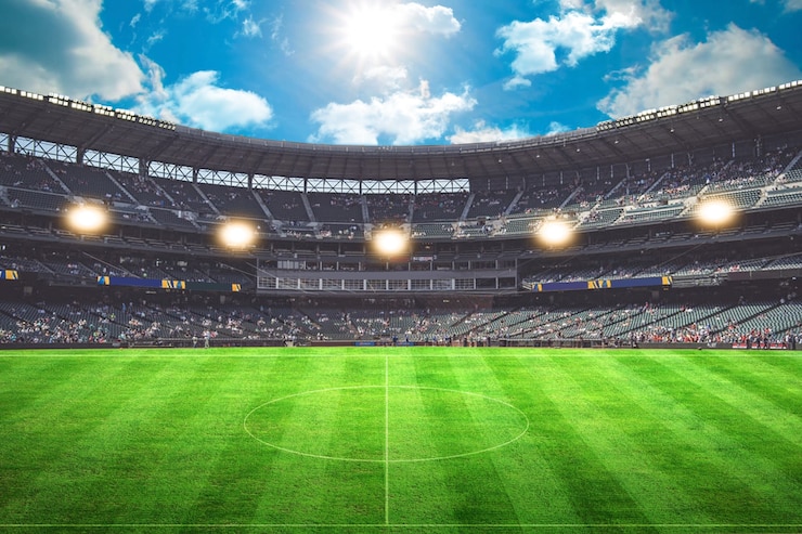 Photo lights at night and football stadium 3d rendering green grass goal spot
