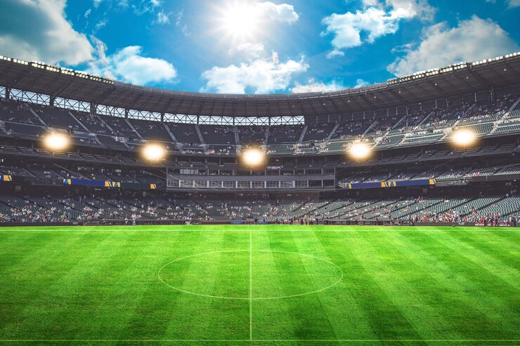 Photo lights at night and football stadium 3d rendering green grass goal spot