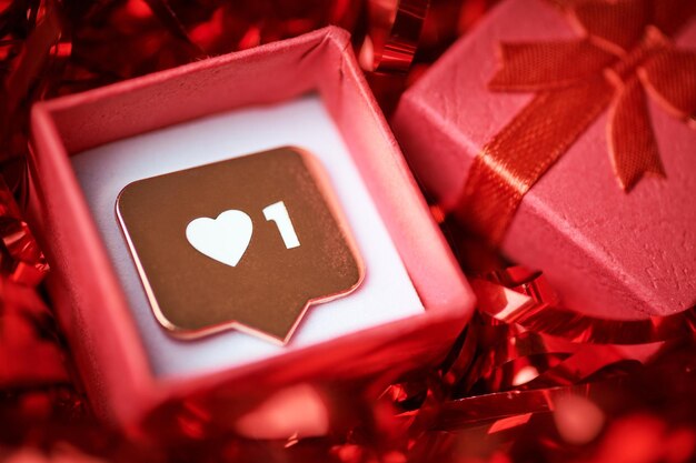 Photo like symbol in gift box like sign heart button symbol with heart and one digit social media