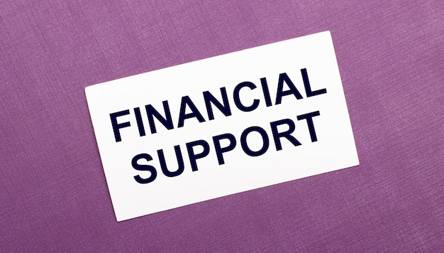 On a lilac background, a white card with the words FINANCIAL SUPPORT