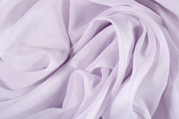 Lilac crumpled fabric as background texture