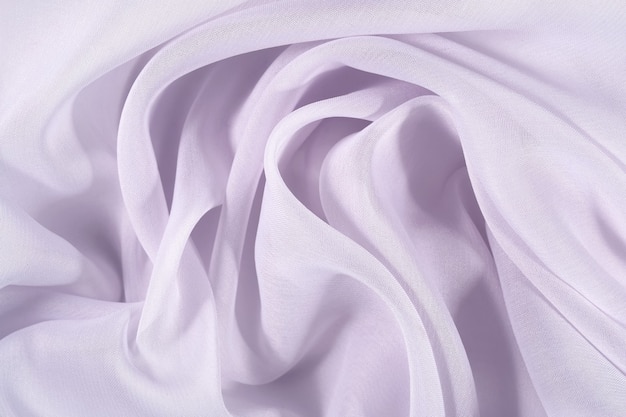 Lilac crumpled fabric as background texture