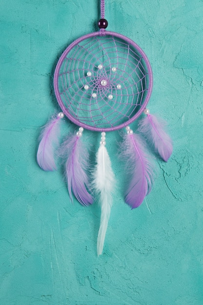 Lilac dream catcher on aquamarine