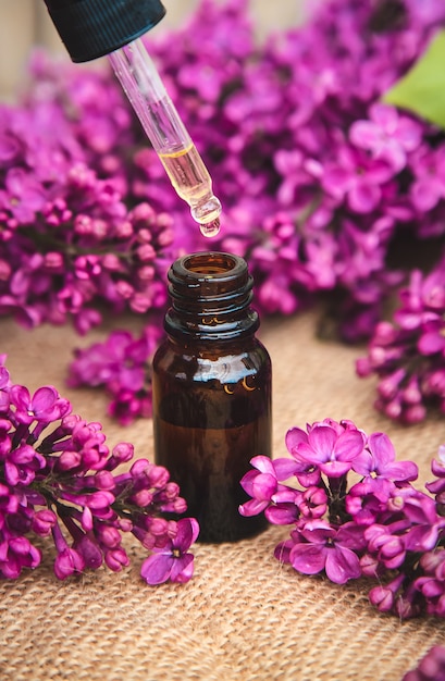 Lilac essential oil in a small bottle