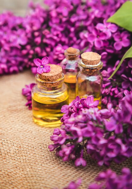 Lilac essential oil in small bottles