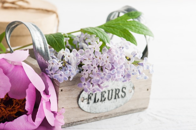Lilac flowers in box closeup
