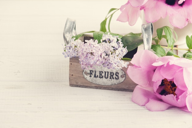 Lilac flowers in box closeup