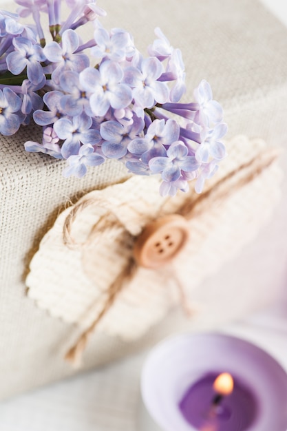 Lilac flowers with gift box