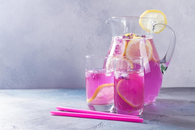 Lilac Lemonade homemade drink jar and glasses on table