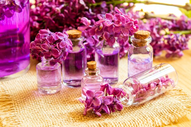 Lilac oil in small bottles selective focusnat