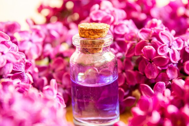 Lilac oil in small bottles selective focusnat