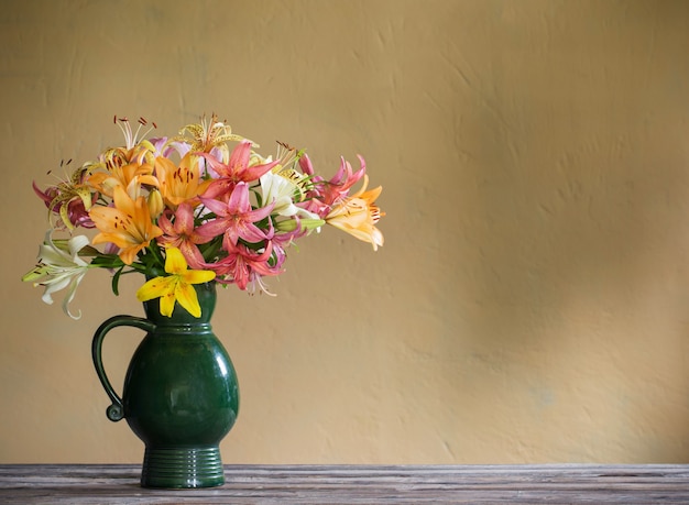 Lily in a ceramic green jug