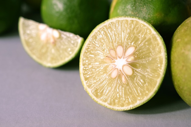 Lime juice with lime slices on table