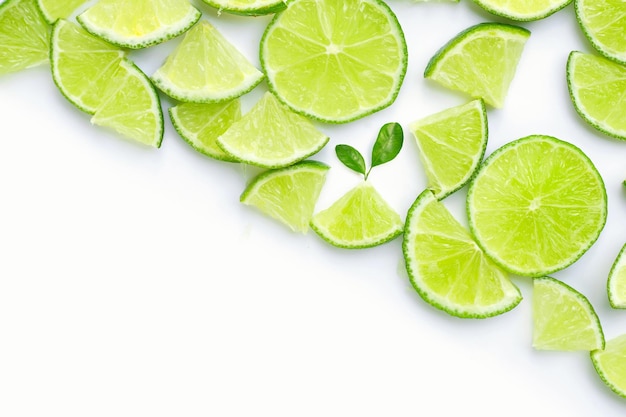 Lime slices on white background