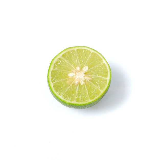 Lime with slices isolated on white