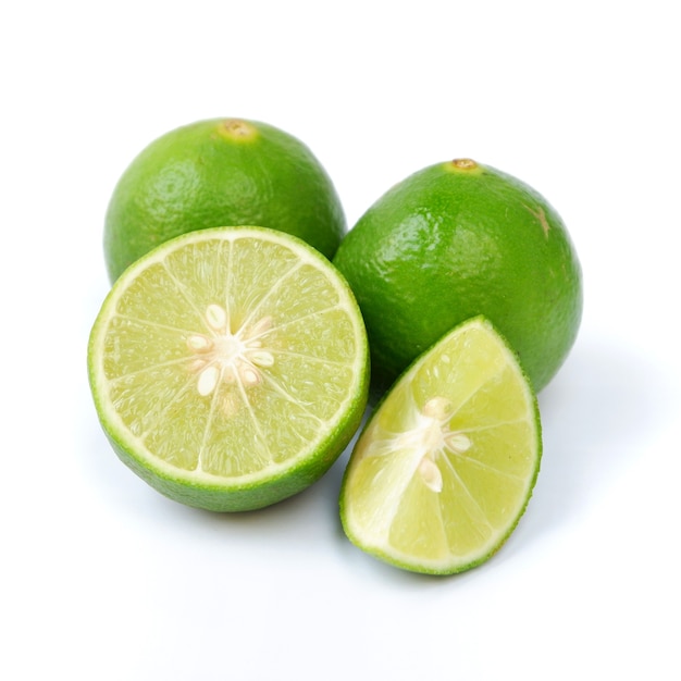 Lime with slices isolated on white