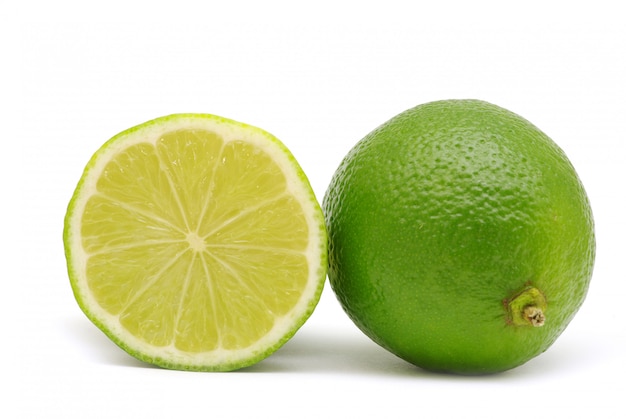 Limes on white wall