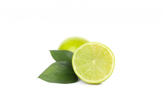 Limes with leaves isolated on whites