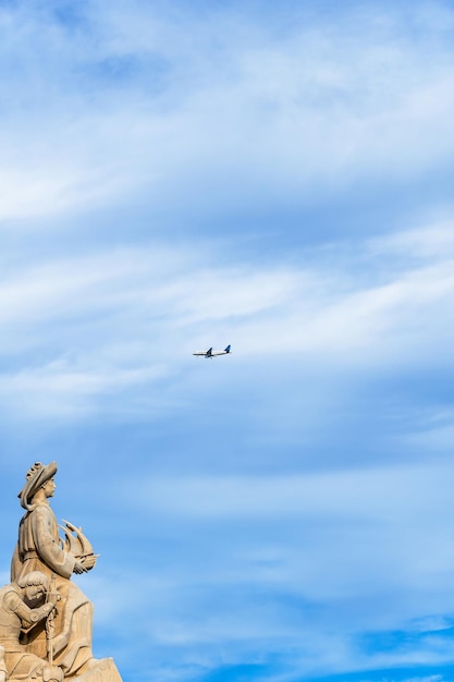 Limestone Monument to the Discoveries with Henry the Navigator holding a ship looking towards