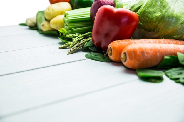 Line of vegetables on table