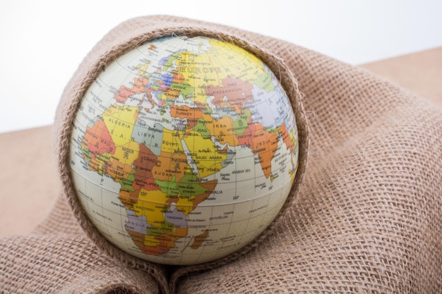 Linen canvas wrapped around a globe