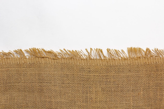 Linen cloth bag halved on white background