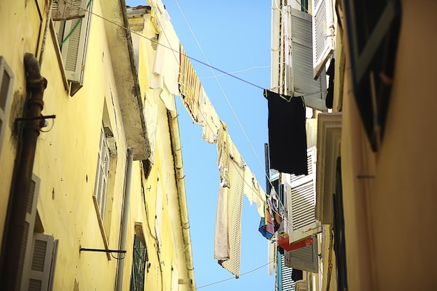 linen is dried in a narrow street of Italy, Italian lifestyle