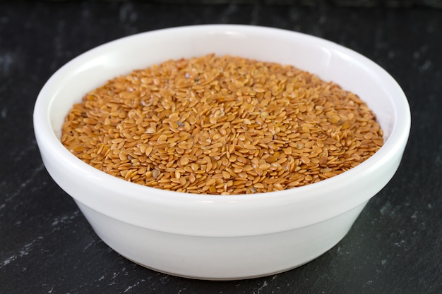 Linseeds in white bowl