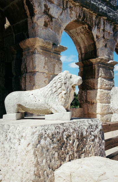 Lion statue, Amphiteater in Pula, Croatia. Roman arena