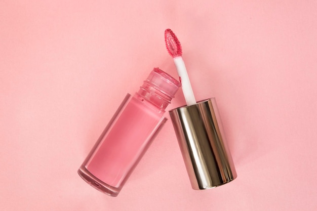 Lip gloss on pink background