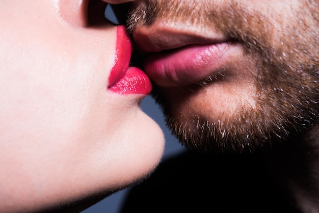 Lips kiss closeup of young romantic couple is kissing each other valentine day love beautiful