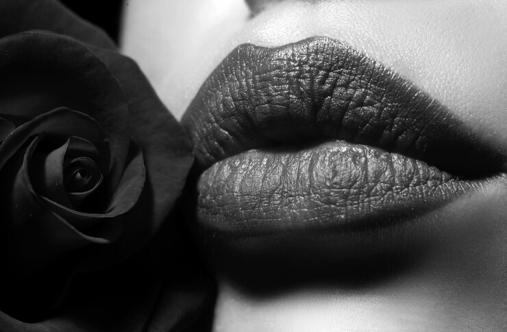 Lips with lipstick closeup beauty red lips makeup detail beautiful woman lips with rose