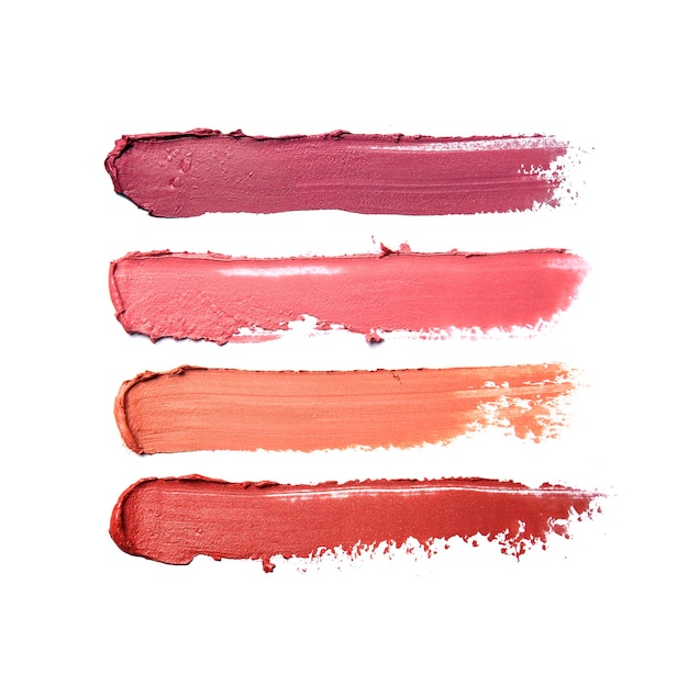 Lipstick brush strokes in different shades isolated on white