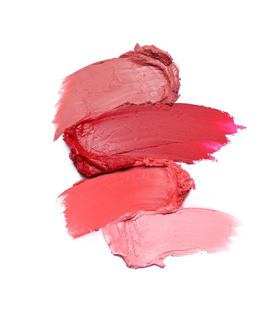 Lipstick brush strokes in different shades isolated on white