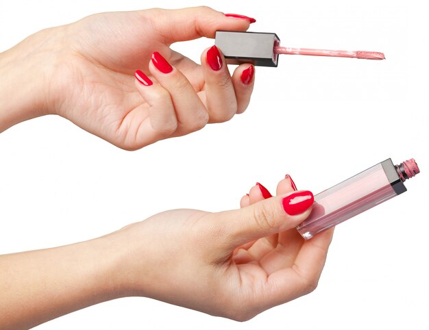 Photo lipstick in hand isolated