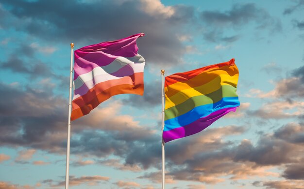 Lipstick Lesbian and LGBT flags on color background