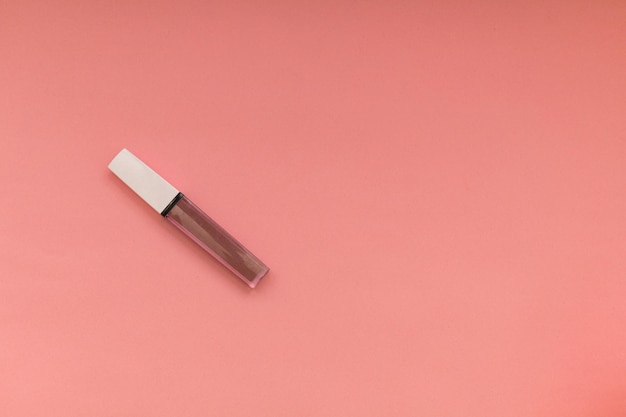 Lipstick on a pink background object shot