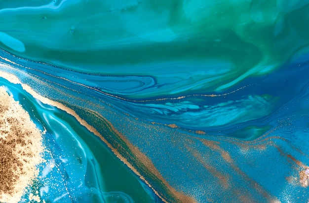 Liquid flow of gold and blue paint pattern