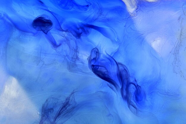 Liquid fluid art abstract background Blue acrylic paint underwater galactic smoke ocean